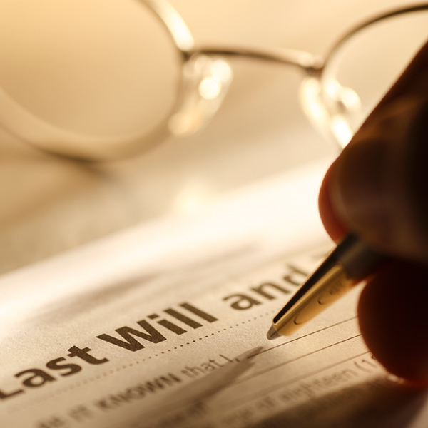 men signing last will
