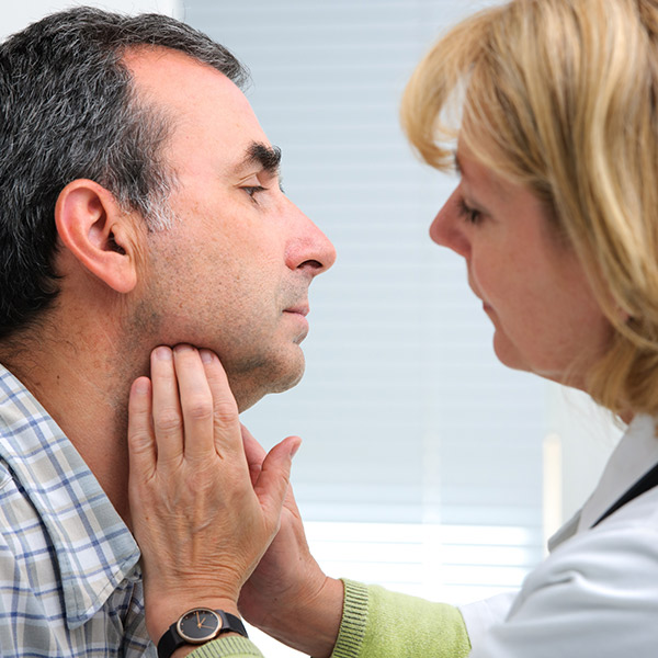 doctor examining patient