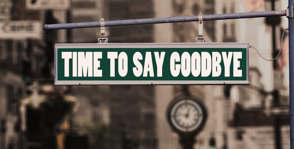 The green color board of time to say goodbye at Lindsay, ON Road sign with text saying time to say goodbye in Lindsay, Ontario, Canada