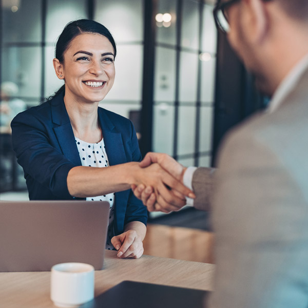 lawyer shaking hands with client